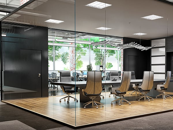 Close-up shot of a renderer's hands expertly smoothing wet render on a wall with a steel trowel, creating a perfectly flat surface.