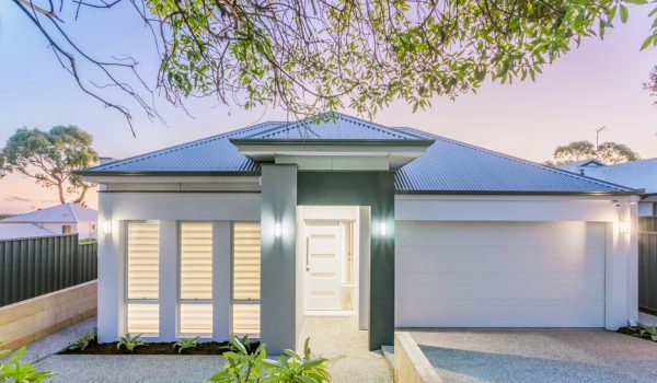 The exterior of a period property carefully restored with a breathable lime render, showing how modern techniques can protect historic buildings.
